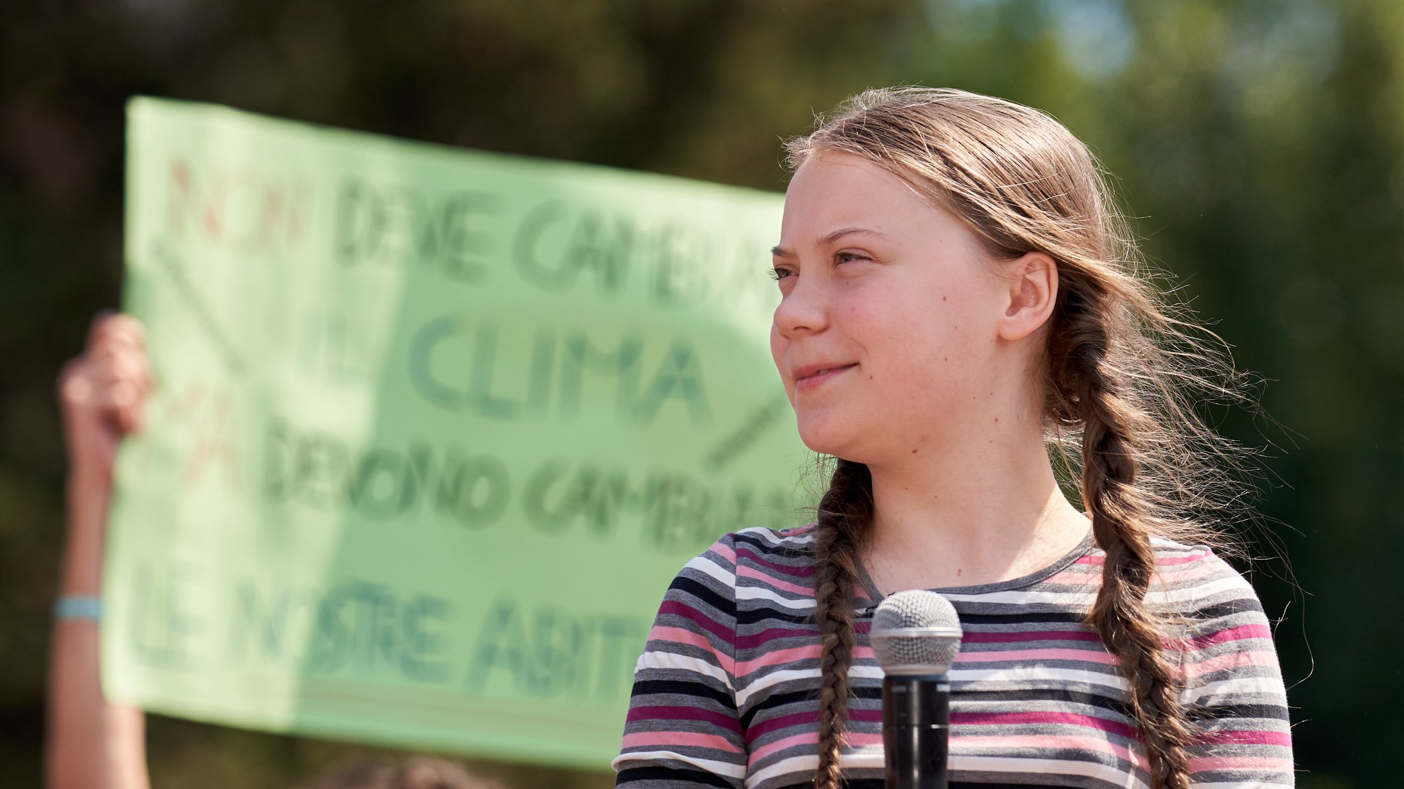Swedish climate activist Greta Thunberg attending Fridays For Future (School Strike for Climate) protest in front of a huge crowd near the Colosseum